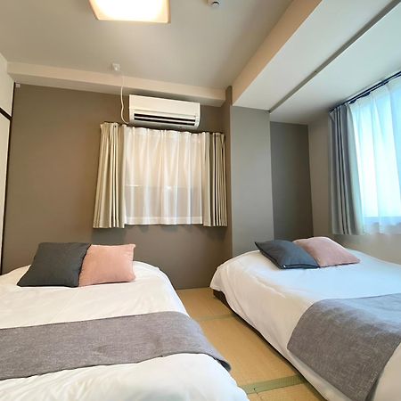 Suyi Apartment Osaka Bagian luar foto